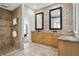 Elegant bathroom featuring a tiled walk-in shower and double sink vanity at 8191 S Bayview Ct, Trafalgar, IN 46181