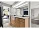 Bathroom featuring double sinks and a large mirror at 8191 S Bayview Ct, Trafalgar, IN 46181