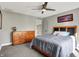 Bedroom with ceiling fan and a view of the hallway at 8191 S Bayview Ct, Trafalgar, IN 46181