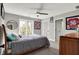 Bedroom with sports memorabilia and a large window at 8191 S Bayview Ct, Trafalgar, IN 46181