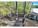 Lake view featuring wood stairs, a bench, and a boat dock with a boat at 8191 S Bayview Ct, Trafalgar, IN 46181