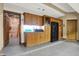 Well-organized garage area with ample cabinet storage and durable, speckled epoxy flooring at 8191 S Bayview Ct, Trafalgar, IN 46181