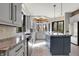 Spacious kitchen with granite countertops, modern appliances, and lots of natural light at 8191 S Bayview Ct, Trafalgar, IN 46181