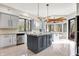 Modern kitchen with granite countertops, stainless steel appliances, and neutral-colored cabinets at 8191 S Bayview Ct, Trafalgar, IN 46181