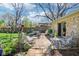 Inviting backyard patio with comfortable seating, ideal for relaxation and entertaining at 8332 Tanager Ln, Indianapolis, IN 46256