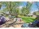 Spacious backyard with lush green grass and patio furniture, perfect for outdoor enjoyment at 8332 Tanager Ln, Indianapolis, IN 46256