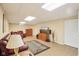 Finished basement area, featuring a comfy seating area, TV, and ample space for entertaining at 8332 Tanager Ln, Indianapolis, IN 46256