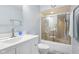 Bright bathroom with a clean white vanity and a shower-tub combo at 8332 Tanager Ln, Indianapolis, IN 46256