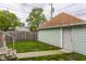 Charming backyard with a well-maintained lawn and string lights, perfect for outdoor activities and relaxation at 926 Olive St, Indianapolis, IN 46203