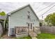 Exterior shot of the home highlighting the backyard with a deck, creating an inviting space for outdoor entertaining at 926 Olive St, Indianapolis, IN 46203