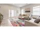 Bright living room with comfortable seating, a stylish rug, and ample natural light at 926 Olive St, Indianapolis, IN 46203