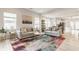 Bright living room with comfortable seating, a stylish rug, and ample natural light at 926 Olive St, Indianapolis, IN 46203