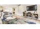Open-concept living room with comfortable seating and seamless flow to the dining area at 926 Olive St, Indianapolis, IN 46203