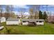 Overhead view of backyard, detached garage, and mature trees at 9570 S 300 W, Columbus, IN 47201