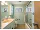 Bathroom features a single sink and combination shower/tub at 9570 S 300 W, Columbus, IN 47201