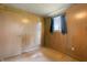 Simple room with wood-paneled walls at 9570 S 300 W, Columbus, IN 47201
