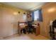 Functional home office with desk, chair, and natural light at 9570 S 300 W, Columbus, IN 47201