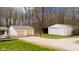 Detached two-car garage and additional outbuilding providing ample storage and parking at 9570 S 300 W, Columbus, IN 47201