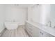 Sleek bathroom with a standalone tub, double vanity, and contemporary design at 1004 Shepherd Rd, Anderson, IN 46012