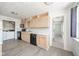 Bright kitchen with light wood cabinets, black appliances, and a clean, functional layout at 1004 Shepherd Rd, Anderson, IN 46012