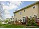 Beautiful home exterior with manicured lawn and lovely patio area for outdoor enjoyment at 1032 Grovewood Dr # 0, Beech Grove, IN 46107