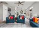 Spacious living room with comfortable seating, neutral-toned rug, and an open layout connecting to the kitchen at 1032 Grovewood Dr # 0, Beech Grove, IN 46107