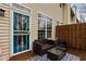 Relax on this cozy patio with outdoor furniture and a decorative rug, perfect for enjoying the fresh air at 1032 Grovewood Dr # 0, Beech Grove, IN 46107