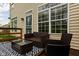 Outdoor seating area with modern furniture and stylish black and white rug, ideal for entertaining or relaxing at 1032 Grovewood Dr # 0, Beech Grove, IN 46107