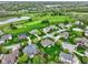 Beautiful aerial view of a neighborhood located next to a well manicured golf course at 10794 Pine Needle Ct, Fishers, IN 46037