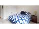 Bedroom with light walls, carpet floors and a full size bed at 10794 Pine Needle Ct, Fishers, IN 46037