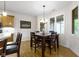 Inviting dining area with wood table and chairs, perfect for Gathering meals and entertaining at 10794 Pine Needle Ct, Fishers, IN 46037