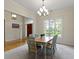 Dining room features large window with front yard view, and entry door visible at 10794 Pine Needle Ct, Fishers, IN 46037