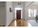 Inviting entryway with hardwood floors leads to living spaces at 10794 Pine Needle Ct, Fishers, IN 46037