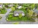 Aerial view of a home on a corner lot with beautiful landscaping and mature trees at 10794 Pine Needle Ct, Fishers, IN 46037