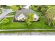 Aerial view of a home with well-kept landscaping, mature trees, and easy access to the street at 10794 Pine Needle Ct, Fishers, IN 46037