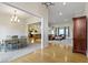 Open concept living space with hardwood floors and stylish decor at 10794 Pine Needle Ct, Fishers, IN 46037