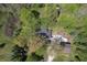 Aerial view of the home with wooded surroundings at 10912 N County Road 950 E, Brownsburg, IN 46112