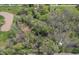 Scenic aerial view of the pond and wooded areas at 10912 N County Road 950 E, Brownsburg, IN 46112