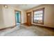 Cozy bedroom featuring natural light with neutral walls and wood trim at 1114 N Mount St, Indianapolis, IN 46222