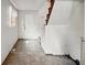 Entryway features a door, window, and staircase at 1114 N Mount St, Indianapolis, IN 46222