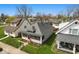 Lovely single-story home with a quaint screened porch and a well-kept lawn, surrounded by trees at 1114 N Mount St, Indianapolis, IN 46222