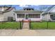 Charming single-Gathering home with a fenced yard and inviting porch at 1114 N Mount St, Indianapolis, IN 46222