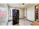 View of the kitchen showing floors, refrigerator, and walls at 1114 N Mount St, Indianapolis, IN 46222