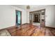 View of the living room featuring hard wood floors and detailed trim at 1114 N Mount St, Indianapolis, IN 46222