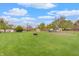 Large backyard with storage sheds and spacious lawn at 120 Crosby Dr, Indianapolis, IN 46227