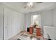Simple bedroom featuring a desk with drawers, a closet, and a laundry freezer at 120 Crosby Dr, Indianapolis, IN 46227