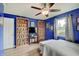 Comfortable bedroom featuring hardwood floors, with collectibles on display at 120 Crosby Dr, Indianapolis, IN 46227