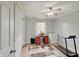 Simple bedroom featuring a desk with drawers, a closet, and a laundry freezer at 120 Crosby Dr, Indianapolis, IN 46227
