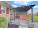 Backyard featuring a covered hot tub with outdoor furniture at 120 Crosby Dr, Indianapolis, IN 46227