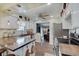 Modern kitchen with wood countertops, white cabinets, stainless steel appliances, and wood floors at 120 Crosby Dr, Indianapolis, IN 46227